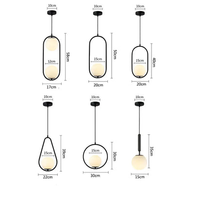 Modern black metal pendant lights set of 4 with frosted glass ball shades in elongated and circular designs decorbites glass ball