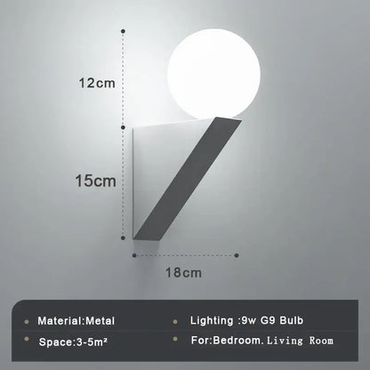 Modern black glass ball wall lamp wall sconce with sleek metallic base and glowing white spherical bulb for bedroom