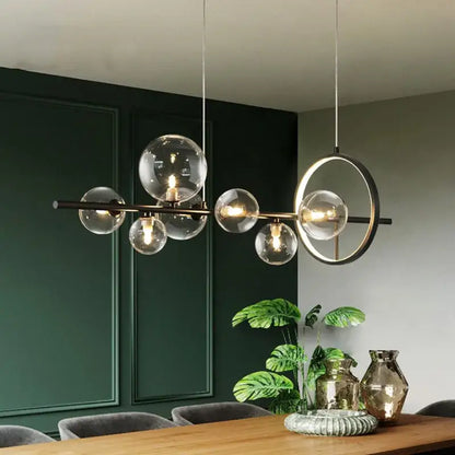 Modern black glass bubble chandelier with clear glass bubble globe pendant light and brass accents for dining room decorbites clear glass