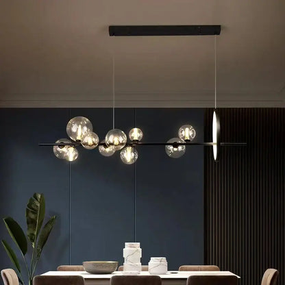 Modern black glass bubble chandelier with clear glass bubble bulbs and sleek minimalist design for dining room decorbites clear glass