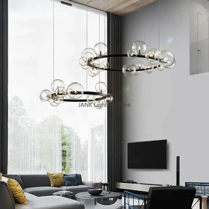 Modern black metal chandelier with clear glass bubble led bulbs in a circular cluster by decorbites for living room decor