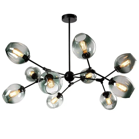 Modern black glass led chandelier pendant light featuring frosted globes with warm filament bulbs for dining room