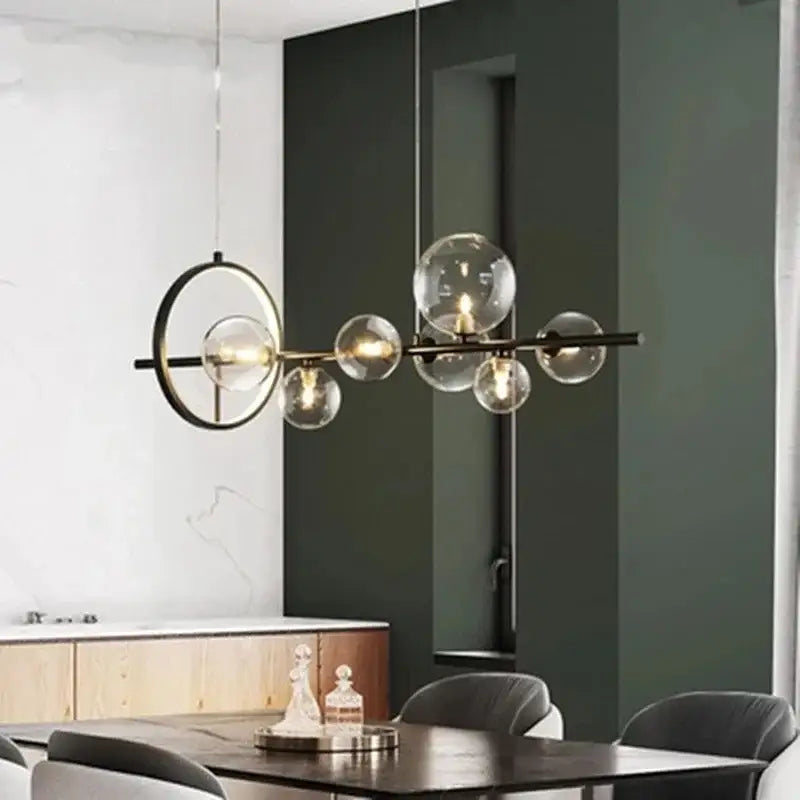 Modern black glass ring pendant light featuring metal chandelier with clear glass globe bulbs for dining room decorbites black glass