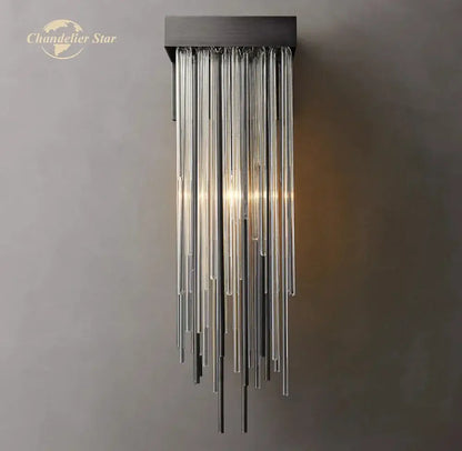 Modern black glass rod led wall lamp with sleek rectangular base and cascading clear glass rods for elegant living room lighting