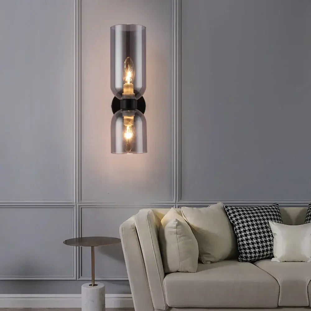 Modern black metal wall lamp with double smoked glass shades for bedroom featuring glass shade wall design