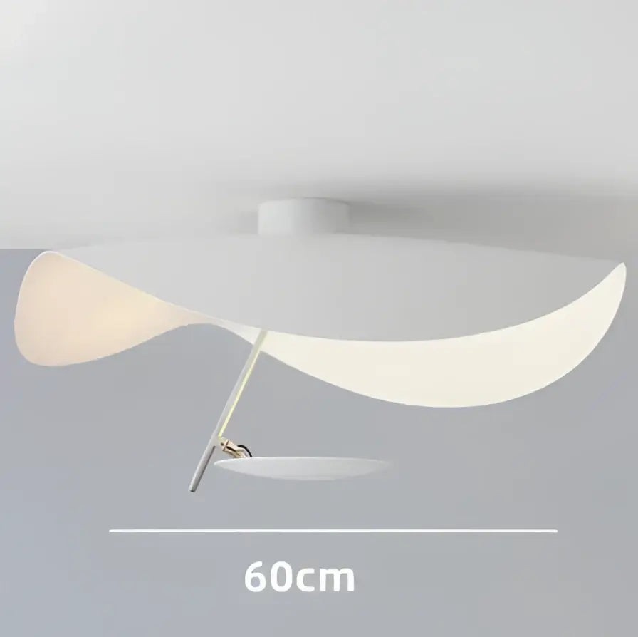 A modern black and gold pendant lamp with a flowing white translucent shade and slender metallic arm for dining room decorbites lederam manta pendant