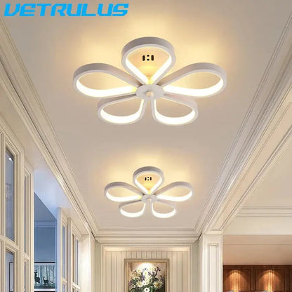 White led ceiling lamp with modern black and gold acrylic flower twisted design featuring five curved petal-shaped arms