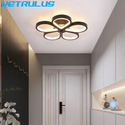 Modern black and gold acrylic flower twisted ceiling lamp with led lights ideal for living room illumination