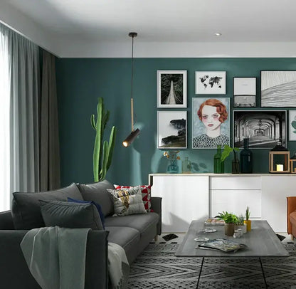 Modern black and gold decorbites adjustable led track light illuminating dark teal wall with framed artwork decorbites adjustable led track