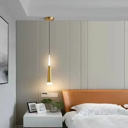 Modern black and gold aluminum cord pendant light with a gold-toned tapered design and warm ambient glow for bedroom