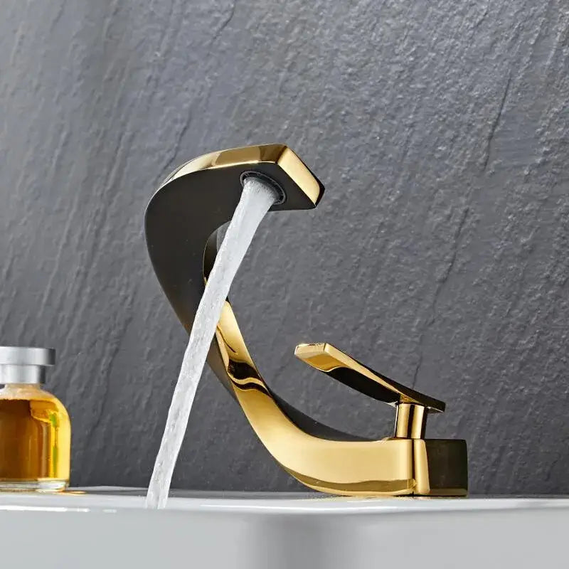 Modern black and gold basin faucet with two-tone waterfall design by decorbites black for bathroom mixer tap