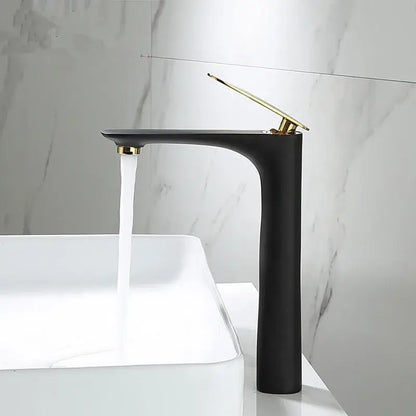 Modern black and gold basin faucet with matte finish and sleek design by decorbites for bathroom sinks