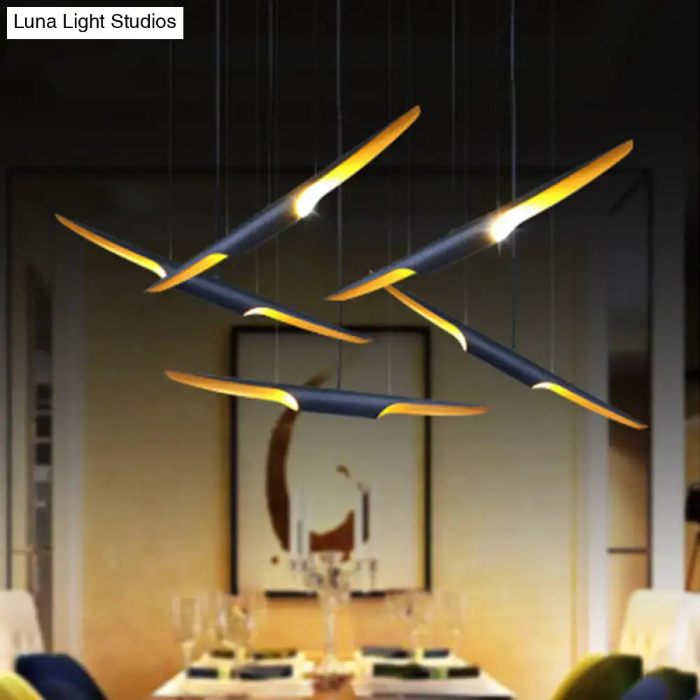 Modern navy blue and gold DecorBites™ pendant lamp with bias cut tube metallic shade in a sleek two-head design