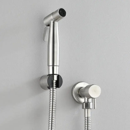Modern black and gold bidet sprayer set featuring a stainless steel handheld showerhead with black rubber nozzle