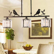 DecorBites modern black gold chandelier lamp with bird accents and three clear crystal drum shade pendant lights
