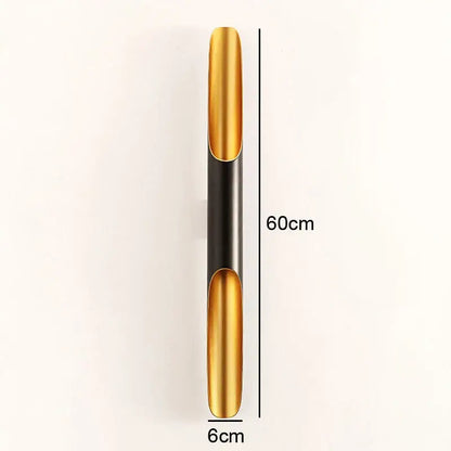 A sleek 60cm tall modern pendant light with polished gold and matte black metal for dining room decorbites coltrane pendant