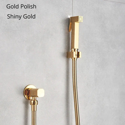 Modern black and gold brass bidet faucet with shiny gold handheld showerhead and flexible braided hose for bathroom use