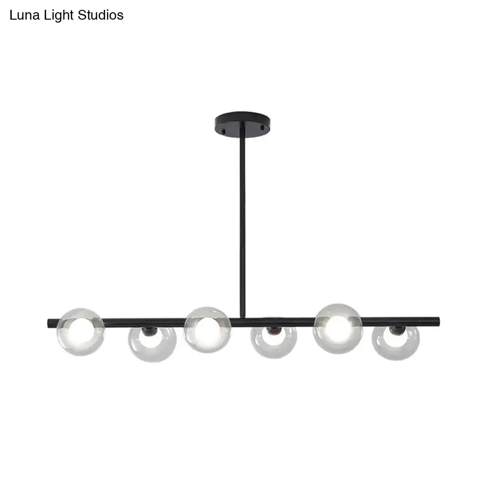 Modern black ceiling light with five bubble clear glass globes for clear glass island or dining room lighting