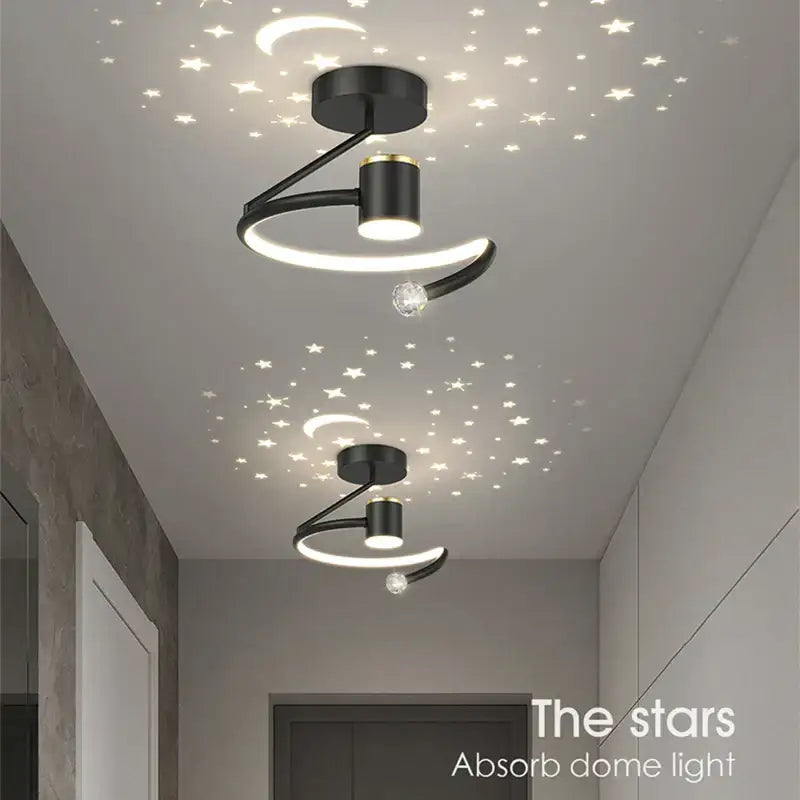 Modern black and gold ceiling lamp with curved design and led ring casting star patterns by decorbites led ceiling lamp