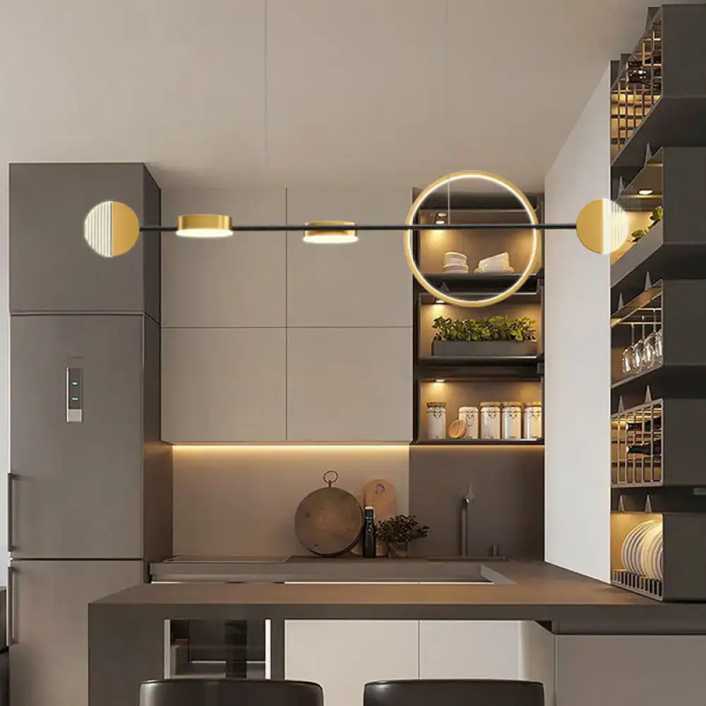 DecorBites contemporary gold metal island pendant light with circle metal illuminated elements for dining room
