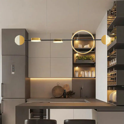 DecorBites contemporary gold metal island pendant light with circle metal illuminated elements for dining room