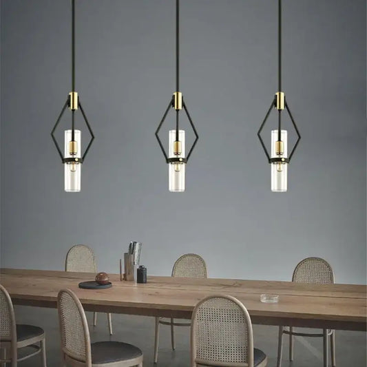 Three modern black and gold pendant lights with clear glass e27 bulbs perfect for dining room decorbites clear glass lighting