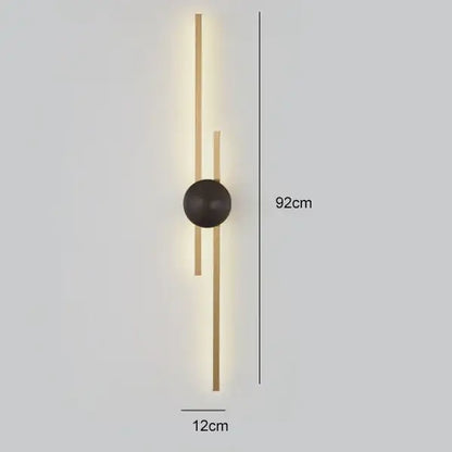 Modern black and gold copper wall light featuring two slender vertical bars and a black circular base for bedroom decorbites copper wall light