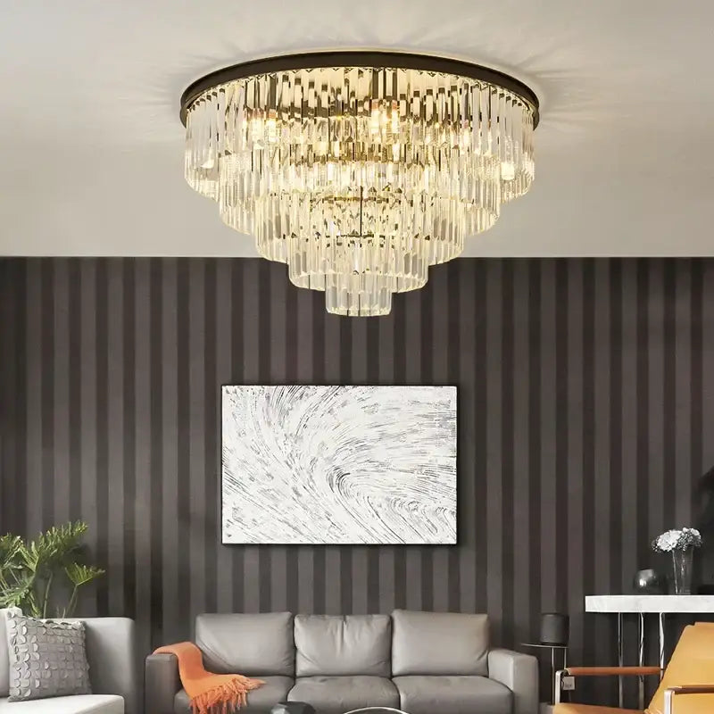 Modern black and gold crystal ceiling chandelier with dark metal frame and cascading clear glass prisms for living room