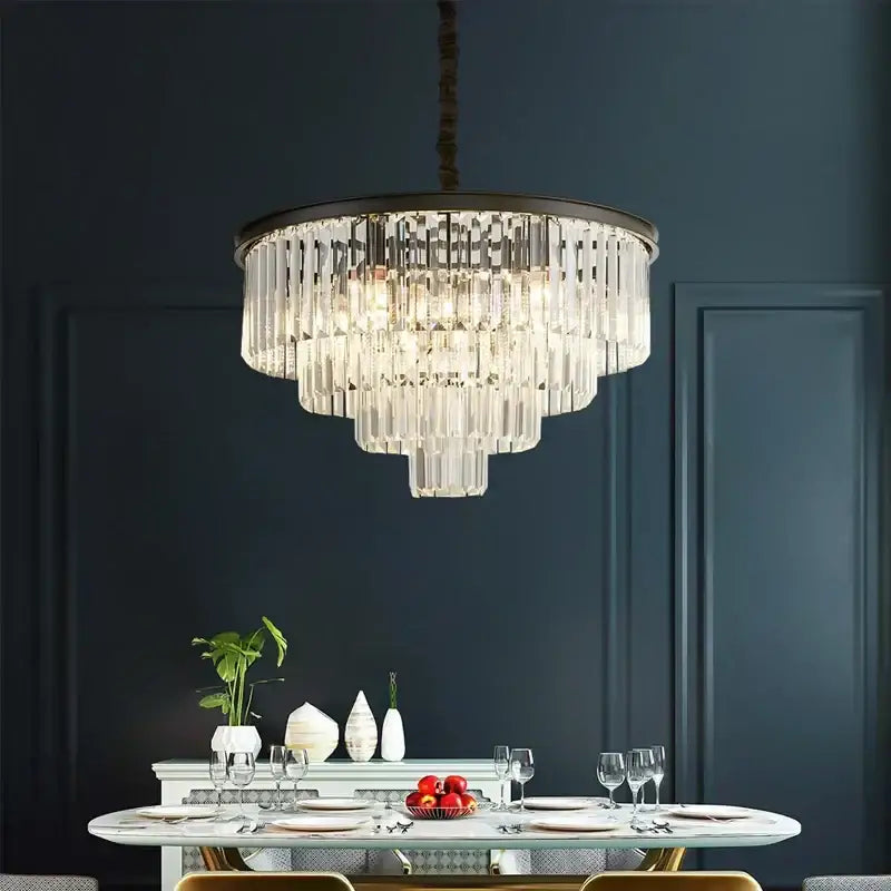 Modern black and gold crystal ceiling chandelier with multi-tiered crystals and dark metal frame for living room lighting