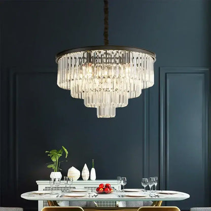 Modern black and gold crystal ceiling chandelier with multi-tiered crystals and dark metal frame for living room lighting