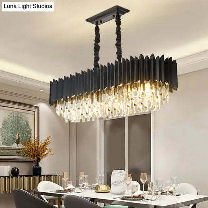 Modern black and gold crystal chandelier with matte black metal frame and cascading clear crystal prisms for dining room