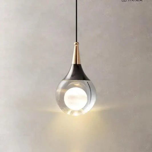 Modern black and gold crystal led ball pendant with clear glass globe and matte top for dining room decorbites crystal led light
