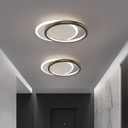 Modern black and gold decorbites crystal led ceiling lights with circular frame and sparkling crystal accents for entrance hallways