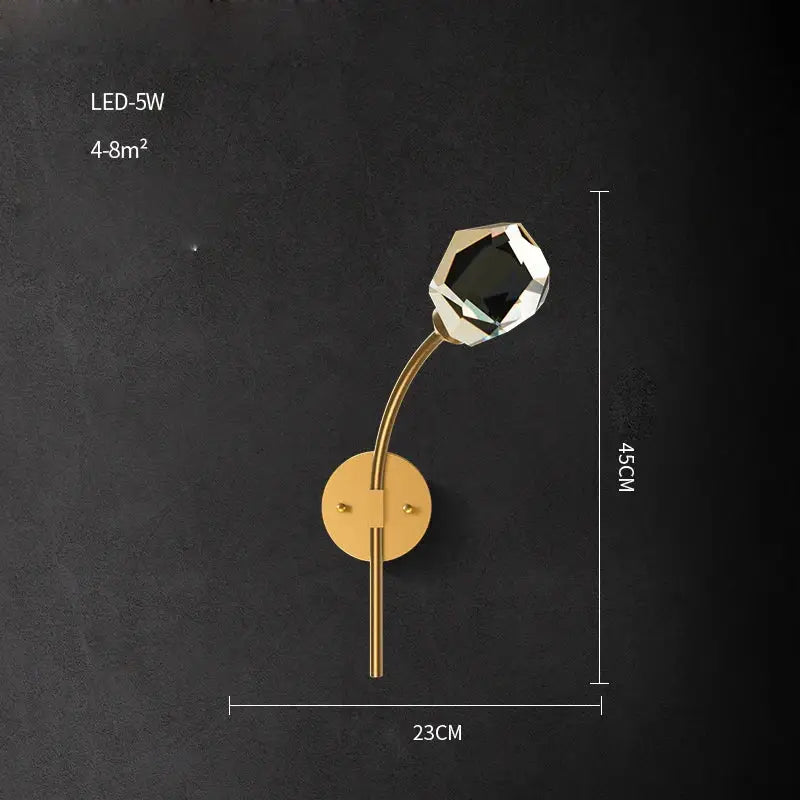 Modern black and gold crystal led wall sconce featuring a gold-toned faceted crystal bulb for elegant decorbites crystal led lighting