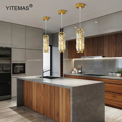 Gold-toned crystal mini pendant chandelier with modern cylindrical design for kitchen decorbites crystal mini lighting
