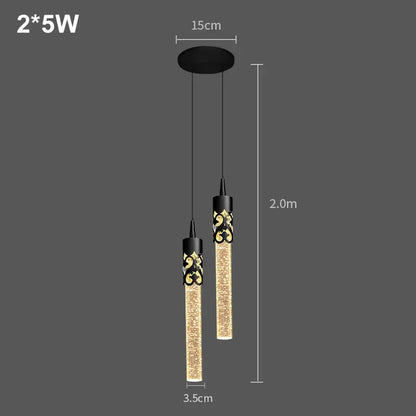 Modern black and gold crystal rod pendant light with two glowing textured glass cylinders for dining room use