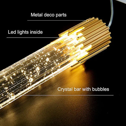 Modern black and gold crystal rod pendant light featuring a golden metallic finish with embedded led lights and floating bubbles