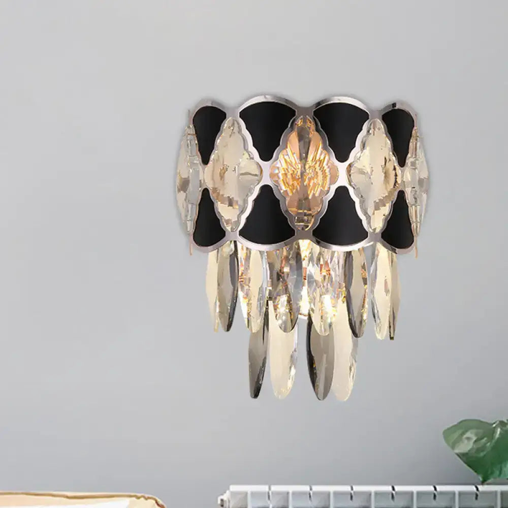 Elegant black and gold crystal wall lamp fixture with cascading mirrored and faceted glass pieces for living room use