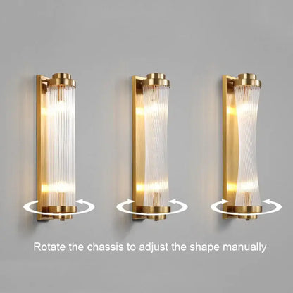 Modern black and gold crystal wall lamp with a gold-finished adjustable cylindrical glass crystal wall sconce for bedroom