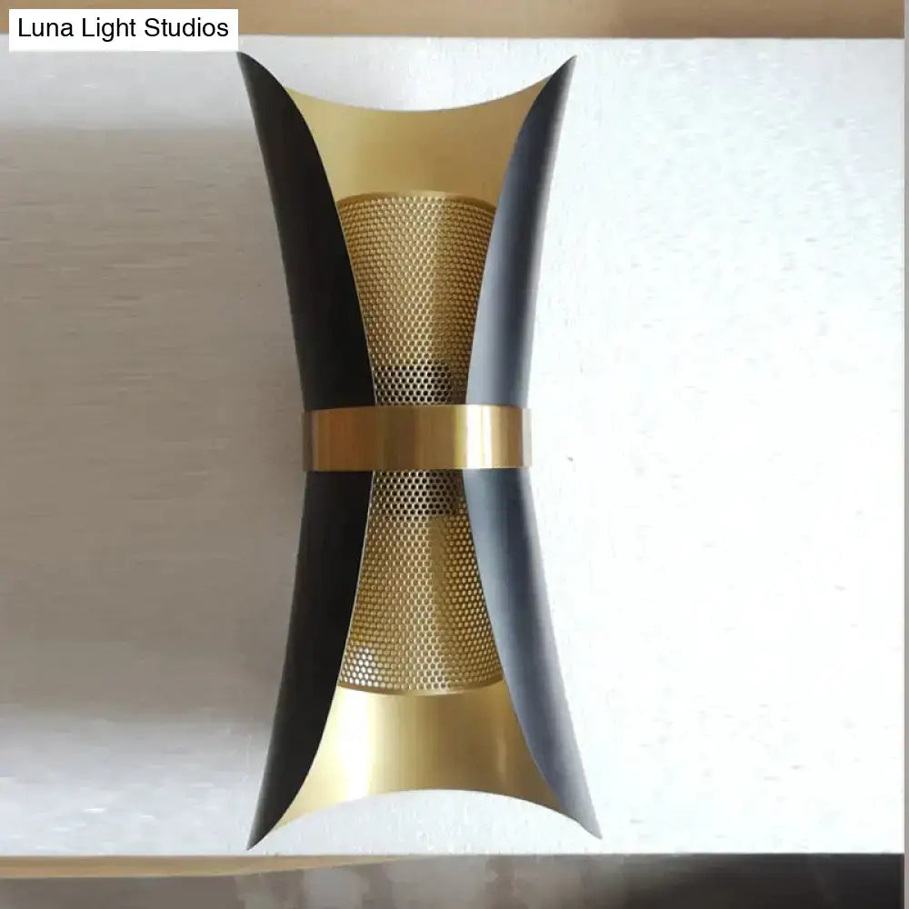 Modern black and gold curved wall lamp with sleek metallic finishes designed for bedroom use