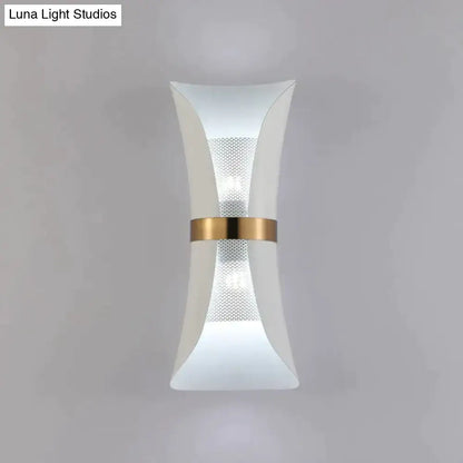 Modern white acrylic wall lamp with gold-toned metallic band and perforated mesh detail for contemporary bedroom use