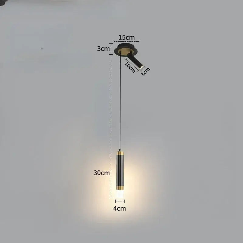 Modern black and gold cylindrical pendant light with a sleek design ideal for kitchens up to five square meters