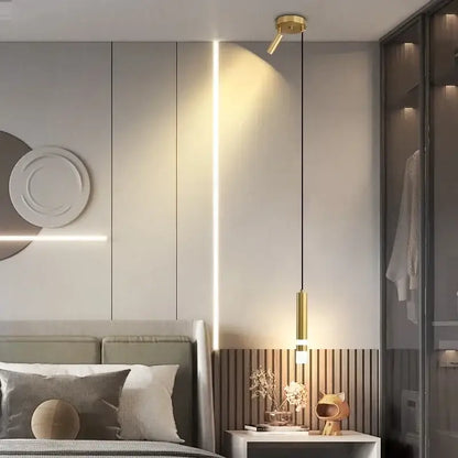 Gold-toned cylindrical pendant light with adjustable spotlight head for modern black and gold double spotlight pendant light kitchen 5 square meters