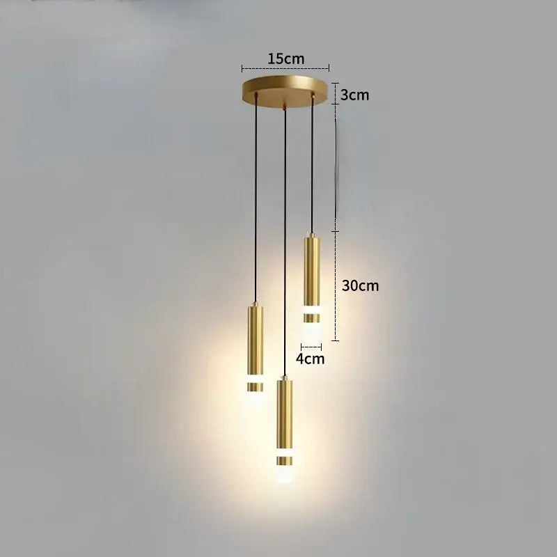 Modern black and gold pendant light with cylindrical elements and circular mount ideal for kitchen 5 square meters