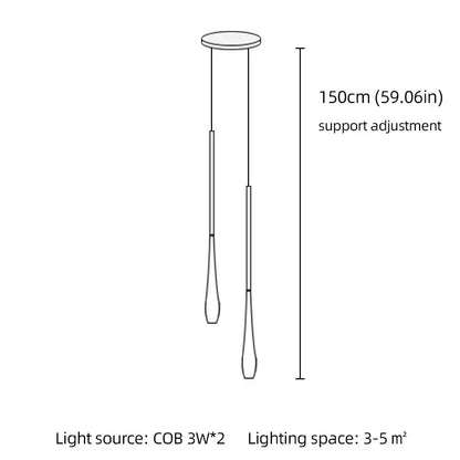 Modern black and gold pendant light with metallic finish and remote control featuring two slender cylindrical shades