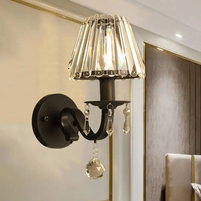 Modern black metal wall sconce with black gold finish crystal chandelier shade and dangling faceted crystals for living room