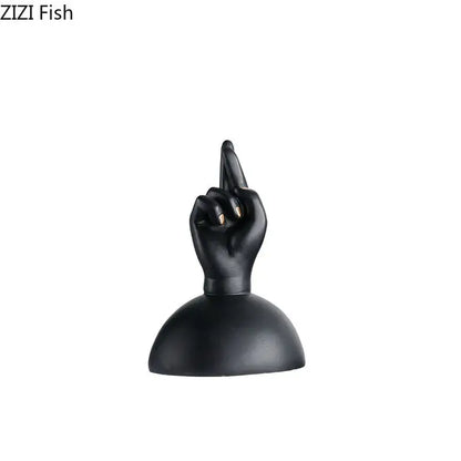 Modern black and gold resin hand sculpture with crossed fingers and gold-tipped nails as foot statue artwork decor