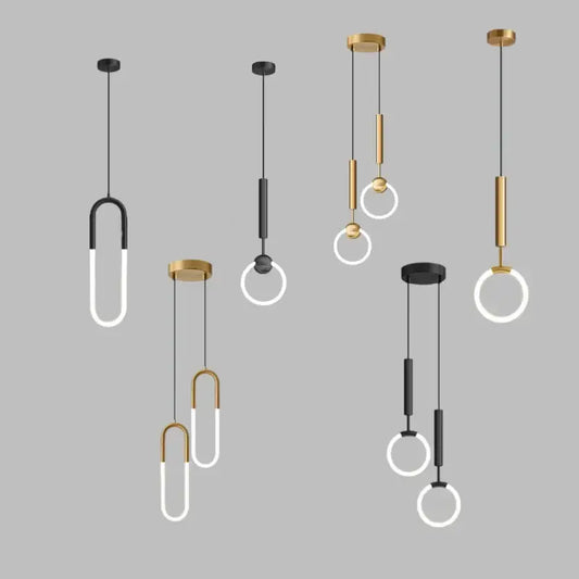 Modern black and gold geometric pendant light with u-shaped and circular light sources for dining room cord pendant use
