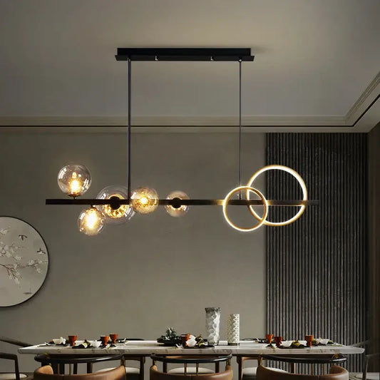 Modern black and gold glass ball led chandelier with spherical glass bulbs and glowing circular rings for dining room decorbites glass ball