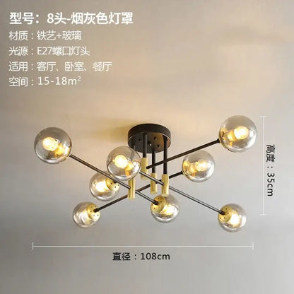 Modern black and gold glass ball led chandelier with smoked glass globe shades and brass accents for living room decorbites glass ball